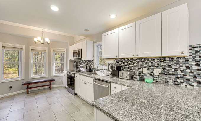 East Stroudsburg Casa | Poconos Family Home by Stream w/ Hot Tub!