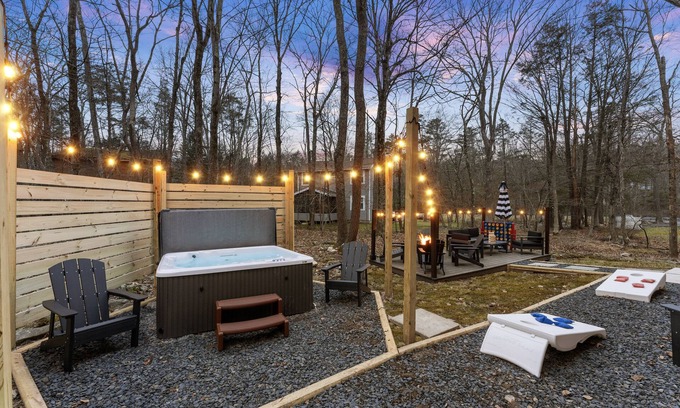 East Stroudsburg Casa | Poconos FUN! Hot Tub, Fire Pit, Game Room, Arcade