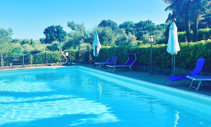 Gavorrano Apartamento | Podere Gli Scopai - Wohnung Nr. 1 mit Großem Garten und Schwimmbad