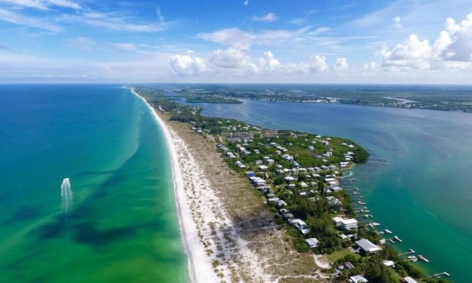 Placida Casa | Point Break: Gulf-front getaway with spacious porches overlooking the beach!