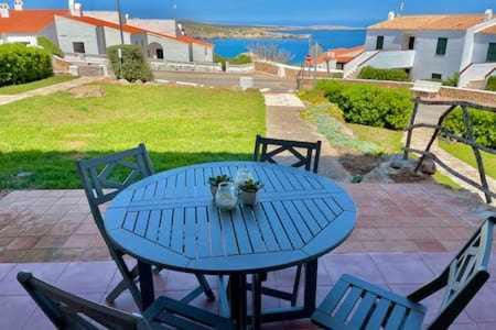 Arenal d'en Castell Apartamento | Ponent - Planta baja con vistas al mar y piscinas