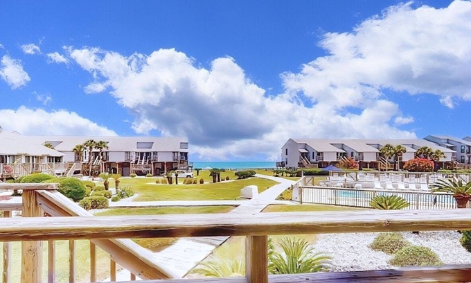 East End Casa | Poolside dog-friendly townhouse with partial Gulf views, on-site pool & grills