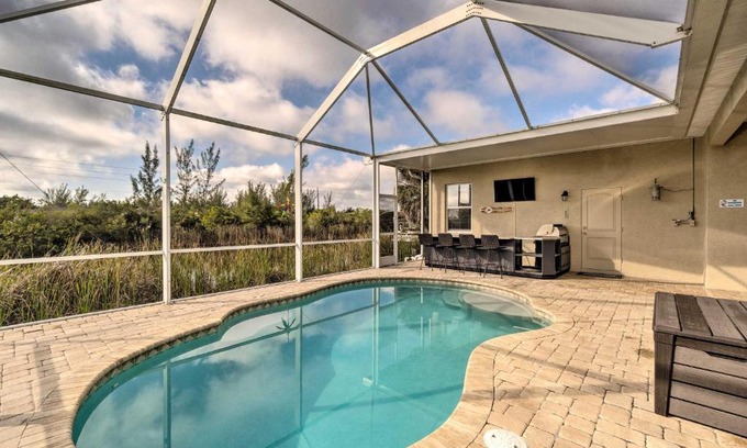 South Gulf Cove Casa | Port Charlotte Canalfront Home with Pool and Dry Bar!