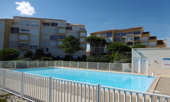 Port Leucate Apartamento | Port Leucate. Playa Argos. Hermoso T2 en planta baja. 4 personas. Piscina. Acceso directo a la playa. Aparcamiento