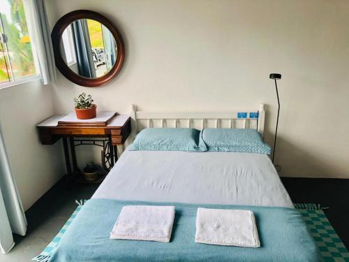 Nossa Senhora de Fatima Apartamento | Pousada LUGAR - Quarto MAR familiar e tranquilo