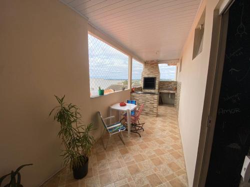 Cara-Cara Apartamento | Pousada Santiago AP-01
