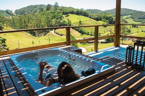 Aguas Mornas Casa | Prana Chalé com Hidromassagem - Águas Mornas - SC