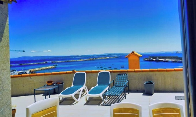 Aguino Apartamento | Precioso ático de alquiler vacacional de lujo.