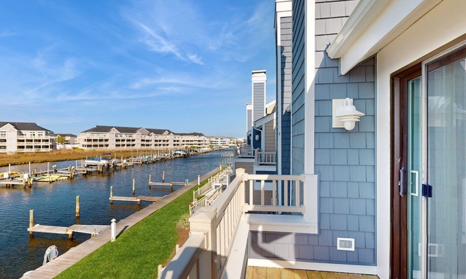 Heron Harbour Isle Casa | Pristine bay front townhome in Ocean City: Sweeping views, modern amenities