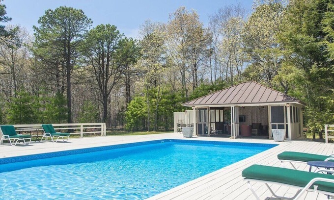 Wainscott Woods Casa | Private Hamptons vacation home, set on an acre of land, entertainer’s...