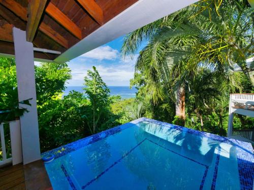 Antoneys Cay Villa | Private Hilltop Home Located Overlooking Roatans Beautiful Turquoise Reef,