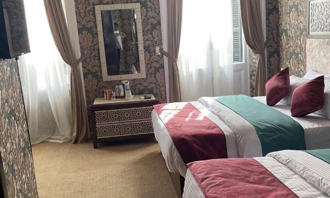 As-Sajil Cama Y Desayuno | HABITACIÓN CUADRUPLE PRIVADA. VISTA A LA CIUDAD