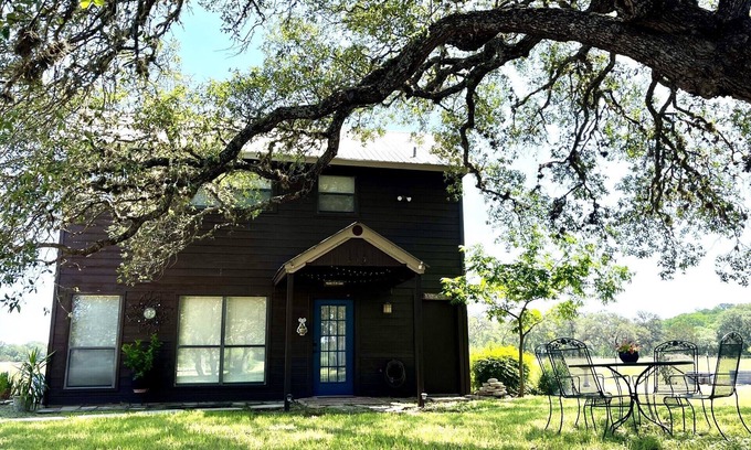 Pipe Creek Cabina | Private, redwood cabin with endless Hill Country views. Horse & dog friendly!
