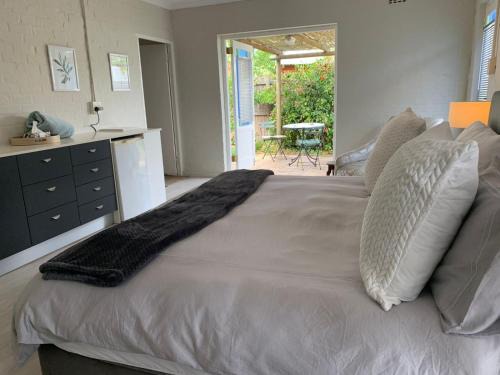 Bloubergstrand Apartamento | Private & Spacious Olive cottage in Bloubergstrand