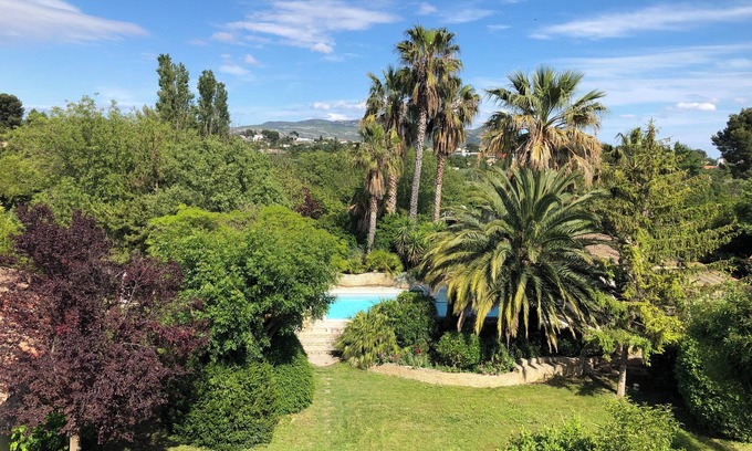 Chateau Gombert Casa | Property with swimming pool, garden and sports field.