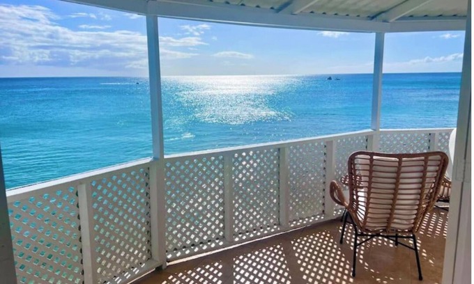 Gibbs Bay Villa | Purple Rain: Beach House, Sun Terraces, Full Kitchen, WiFi under azure skies