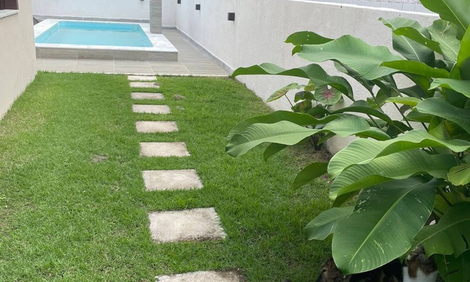 Aratuba Casa | Quarto com 2 camas de solteiros