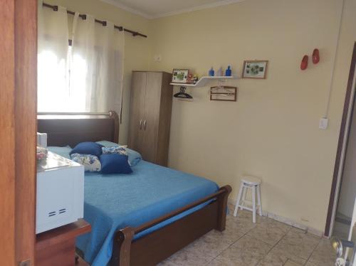 Holambra Casa | QUARTO CONFORTAVEL COM GARAGEM