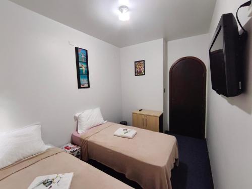 Jardim Carvalho Casa | Quarto FIRST CLASS econômico DUPLO