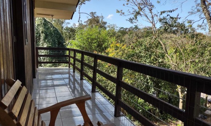 Praia Grande Apartamento | Quarto Ipê Rosa