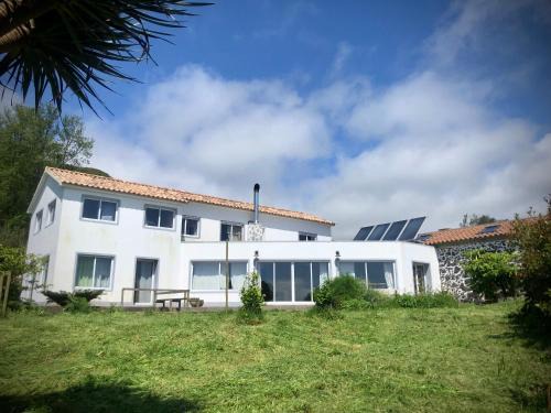 Lajes das Flores Casa | Quarto Laranja Casa citrina