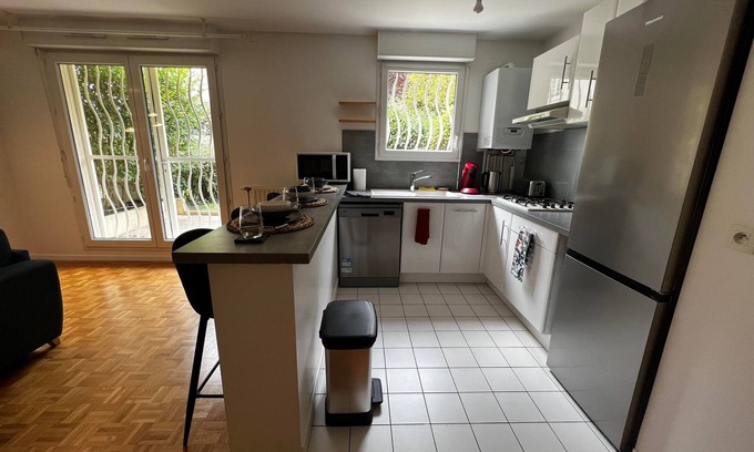 Le Bourget Apartamento | Quiet apartment with garden and parking. 15 minutes from Paris