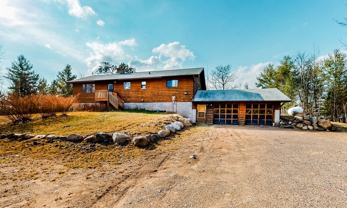 Lac du Flambeau Casa | Quiet lakefront home with dock, canoe, & sunroom - dog-friendly