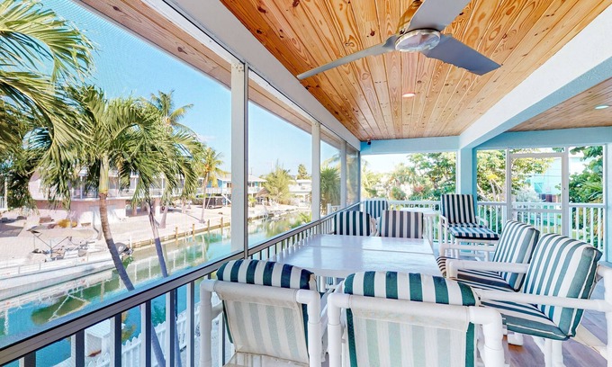 Islamorada Casa | Radiant waterfront retreat with remarkable views, patio, tennis court, & grill