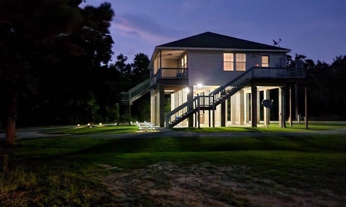 Pass Christian Casa | Raised 3 bed 2 bath house with canal access to Wolf River