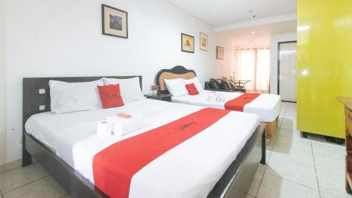Makati Hotel | RedDoorz at TJMG by Bel Air Polaris Makati