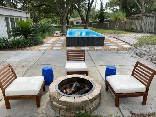 Bearss Plaza Casa | Reel relaxing across from River in Huge 24 foot Swim Spa