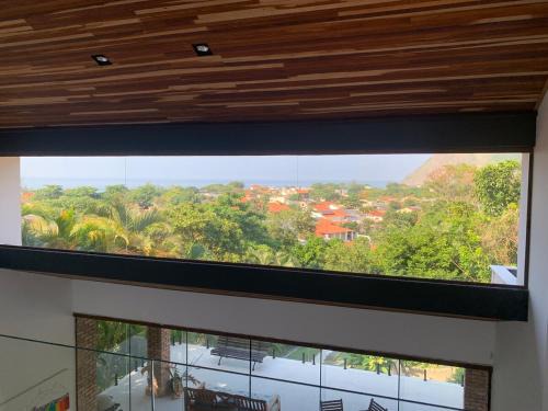Itacoatiara Casa | Refúgio com vista mar e verde