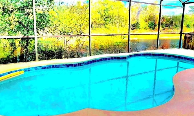 Lindfields Villa | Ref 93PF. Modern lake view pool home. Very close to Disney