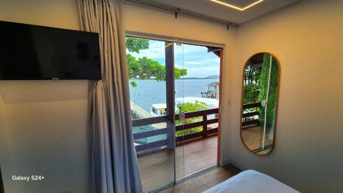 Canto dos Aracas Hotel | Refugio Bela Ilha Luxo Casal Acesso por Barco