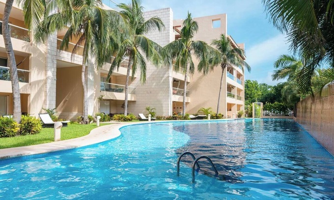 Puerto Aventuras Apartamento | Relajate hermoso jardín y 2 piscinas
