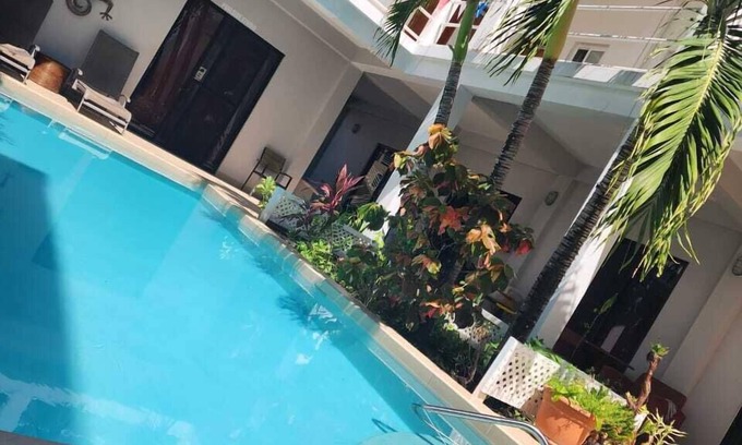 Cayo Corker Apartamento | Relax and Unwind in Our Serene Poolside Studio Retreat!"