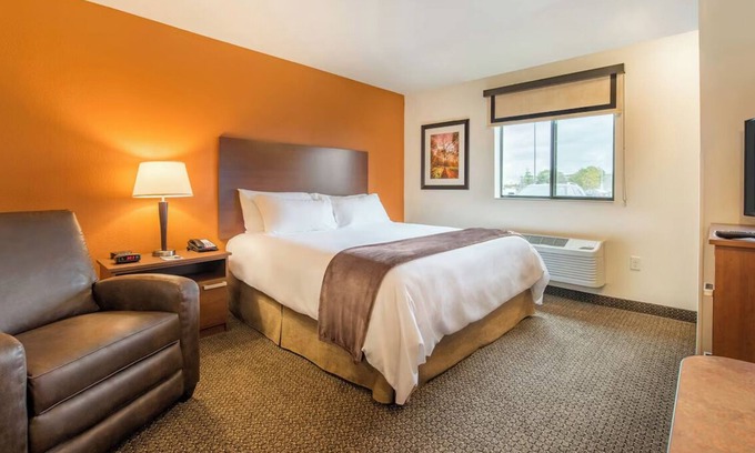 West Valley City Hotel | Relax in a Room with Kitchen Close to Salt Lake Attractions! Pets Allowed!