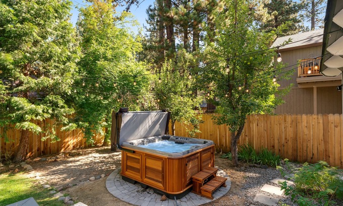 Tahoe Island Casa | Relaxing dog-friendly home with fireplace, hot tub, patio, game room, & W/D