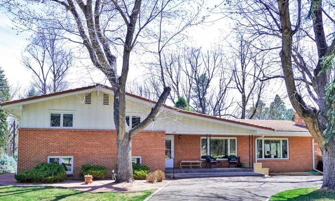 Broadmoor Casa | Relaxing Home with Private Hot Tub, Fast WiFi, Gas Fireplace, and Washer/Dryer