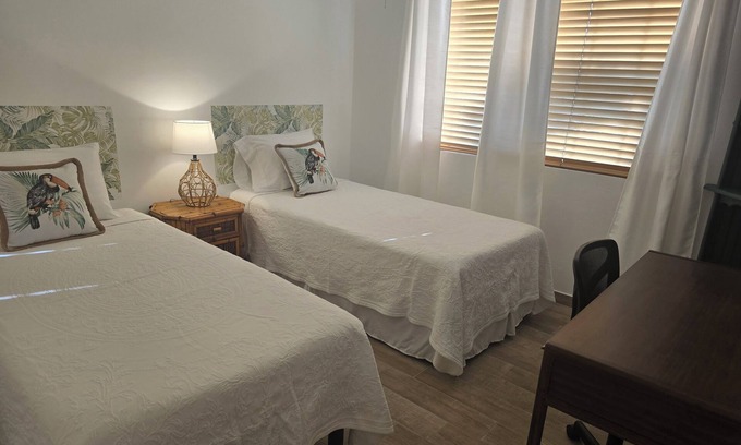 Greenacres Casa | Casa Tropical- 3 bedroom & 2 bath paradise with beautiful green landscaping