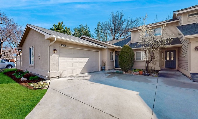 Southeast Boise Casa | Relaxing retreat with a gas fireplace, fenced yard, patio, & washer/dryer