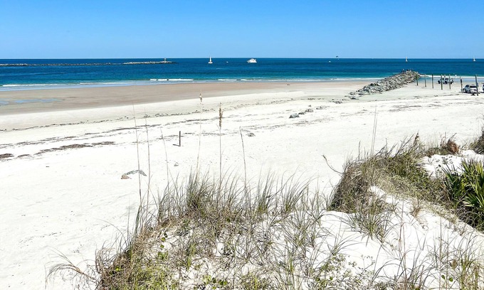 Point East Condominio | Renovated Beach Condo with Views of Non-Driving Beach and Pool!