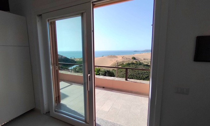 Torre dei Corsari Apartamento | Renovated house overlooking dunes and pristine sea.