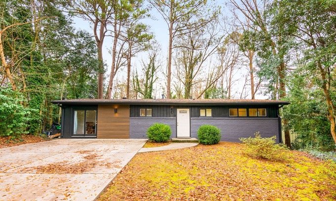Buford Highway Casa | Renovated retreat with large deck, fireplace, & washer/dryer - dog-friendly