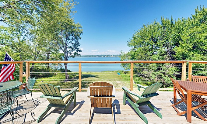 Lamoine Beach Cabaña | Renovated waterfront cottage with expansive deck, multiple fireplaces, & grill