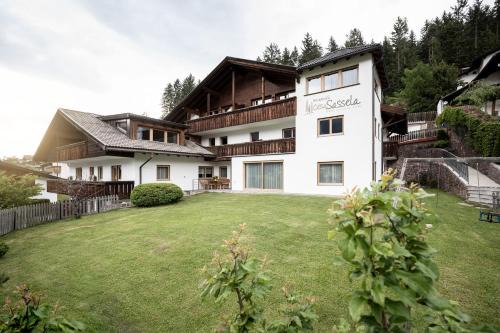 Ortisei Apartamento | Residence Cesa Sassela