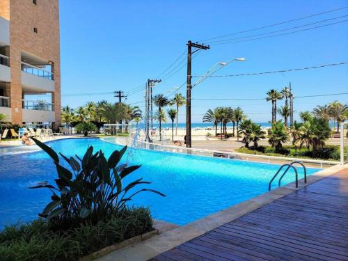 Guilhermina Apartamento | Resort-Beira-mar com piscina, ar-condicionado e 2 suítes