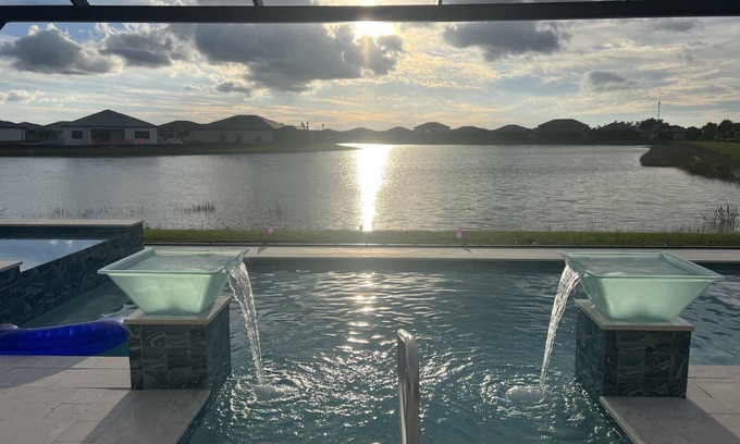 Estero Casa | Resort Like Retreat ! Inground heated pool/hot tub/large lanai and much more!