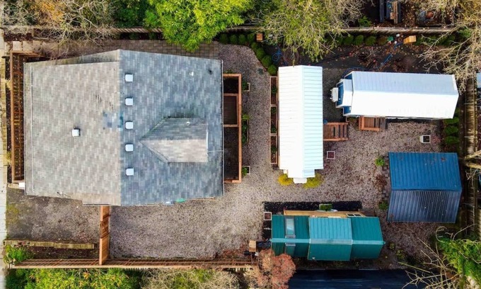 Hosford-Abernethy Casa | Restored Farmhouse & Backyard Tiny House Village