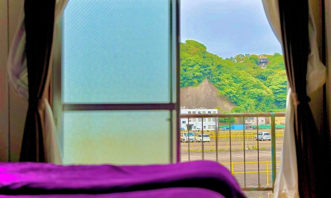 Yokosuka Casa | Retro Romantic Room! Private rooftop room with a view of Tokyo Bay beyond the Uraga Dock.
